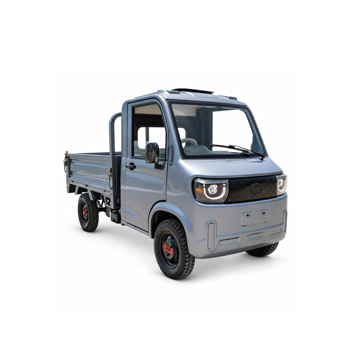 Grey Ice Cream electric pickup with a cargo bed, viewed from the front corner