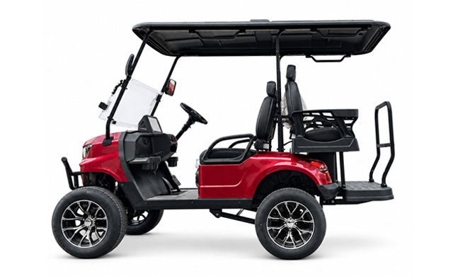 Side view of a red electric golf cart with a black roof and rear-facing seat